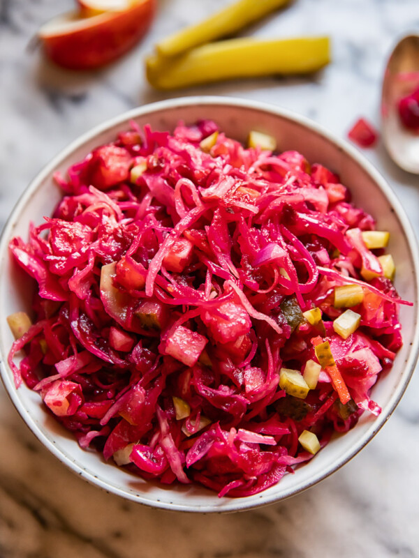 red cabbage and beet salad in a grey bowl