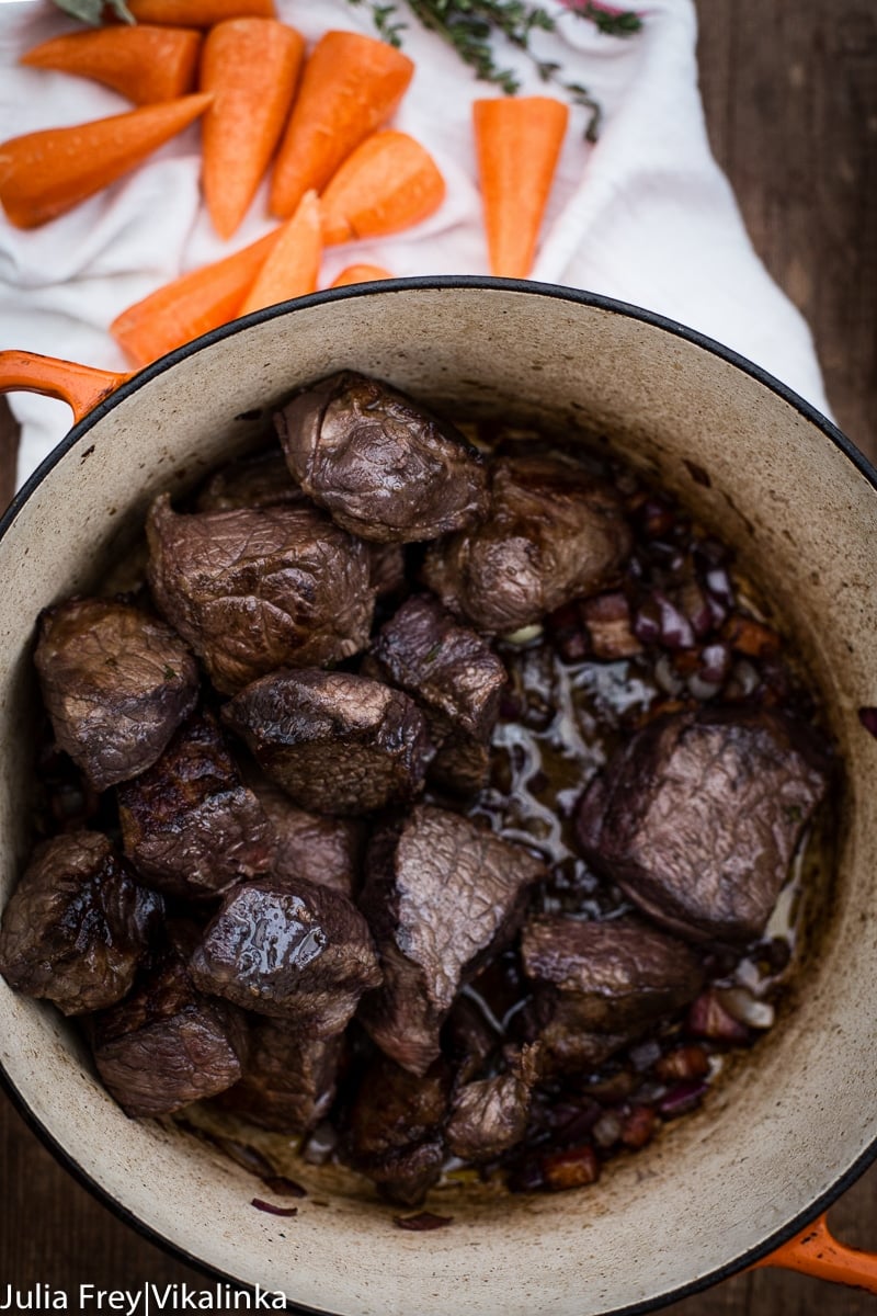 The meat stewing in a pot