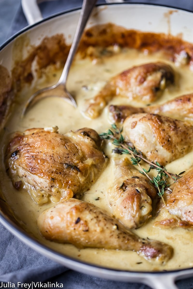 chicken in mustard cream sauce in white pan