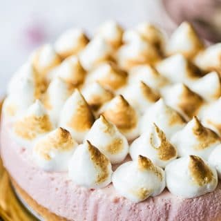 Close view of cheesecake showing meringue with light browning