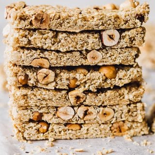 Stack of granola bars on parchment paper