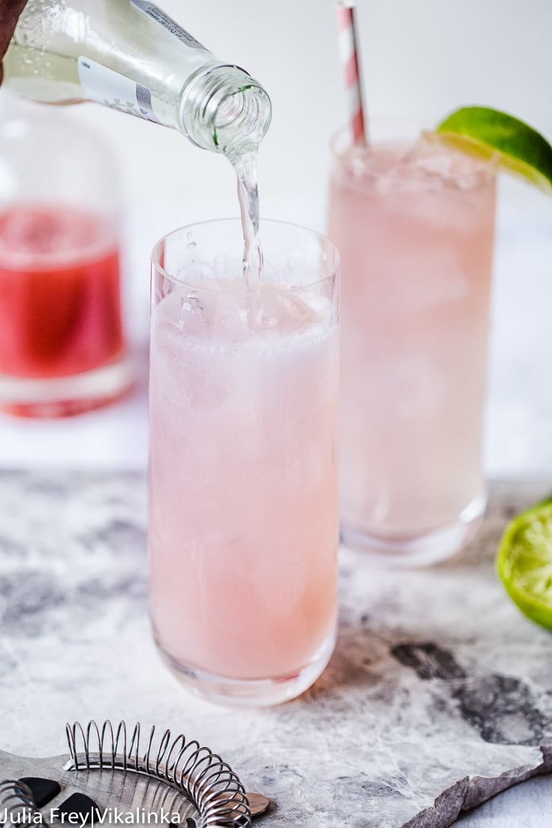 Rhubarb Moscow Mule in a glass being topped with sparkling drink