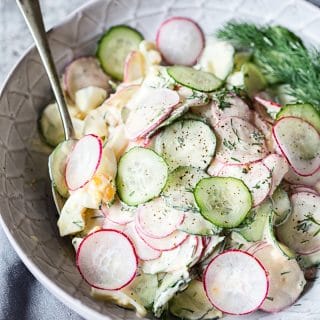 cucumber, radish and egg salad in a creamy dressing with dill