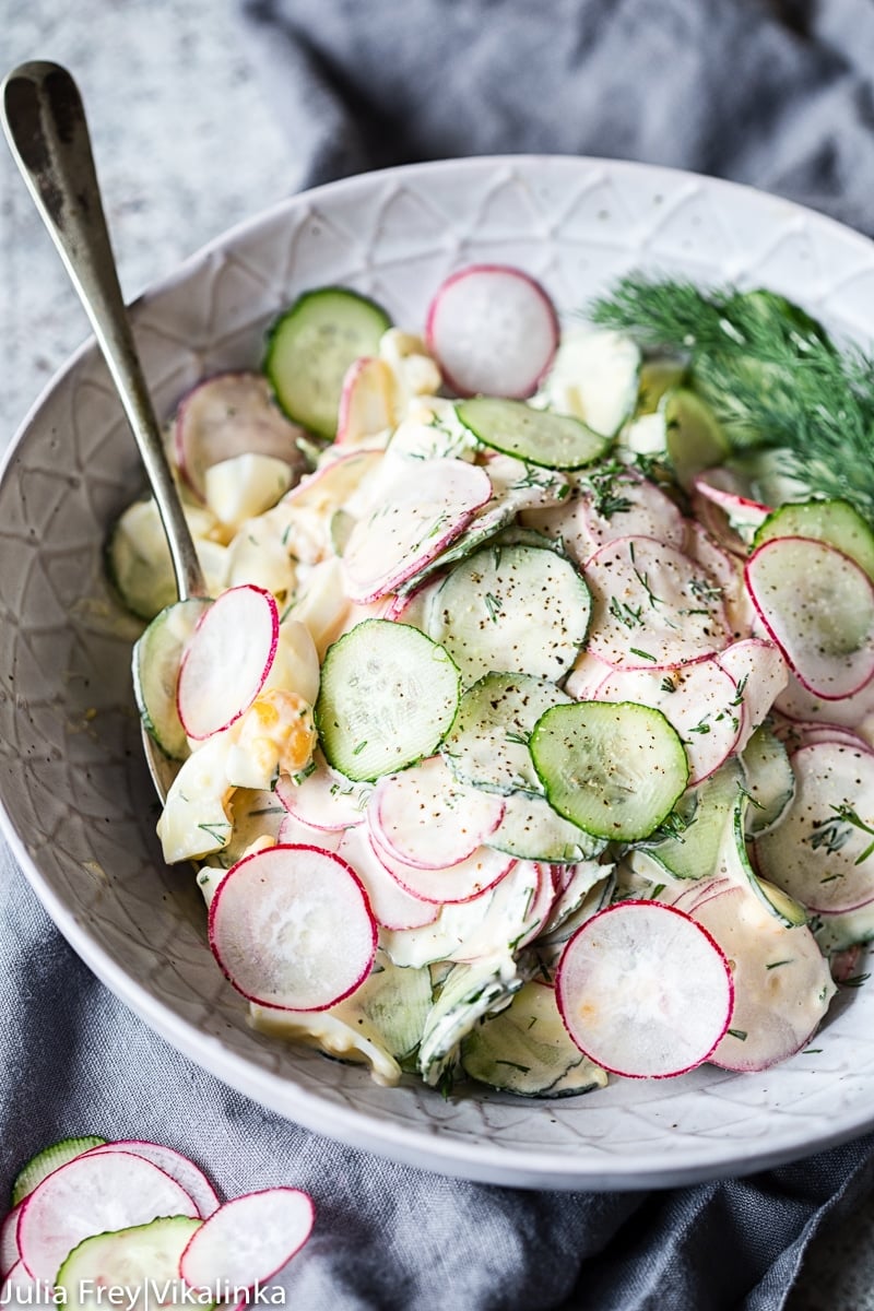 cucumber, radish and egg salad in a creamy dressing with dill