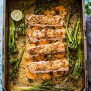 Baking tray with salmon and vegetables