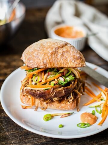 Asian pulled pork buns with carrot, zucchini and radish slaw
