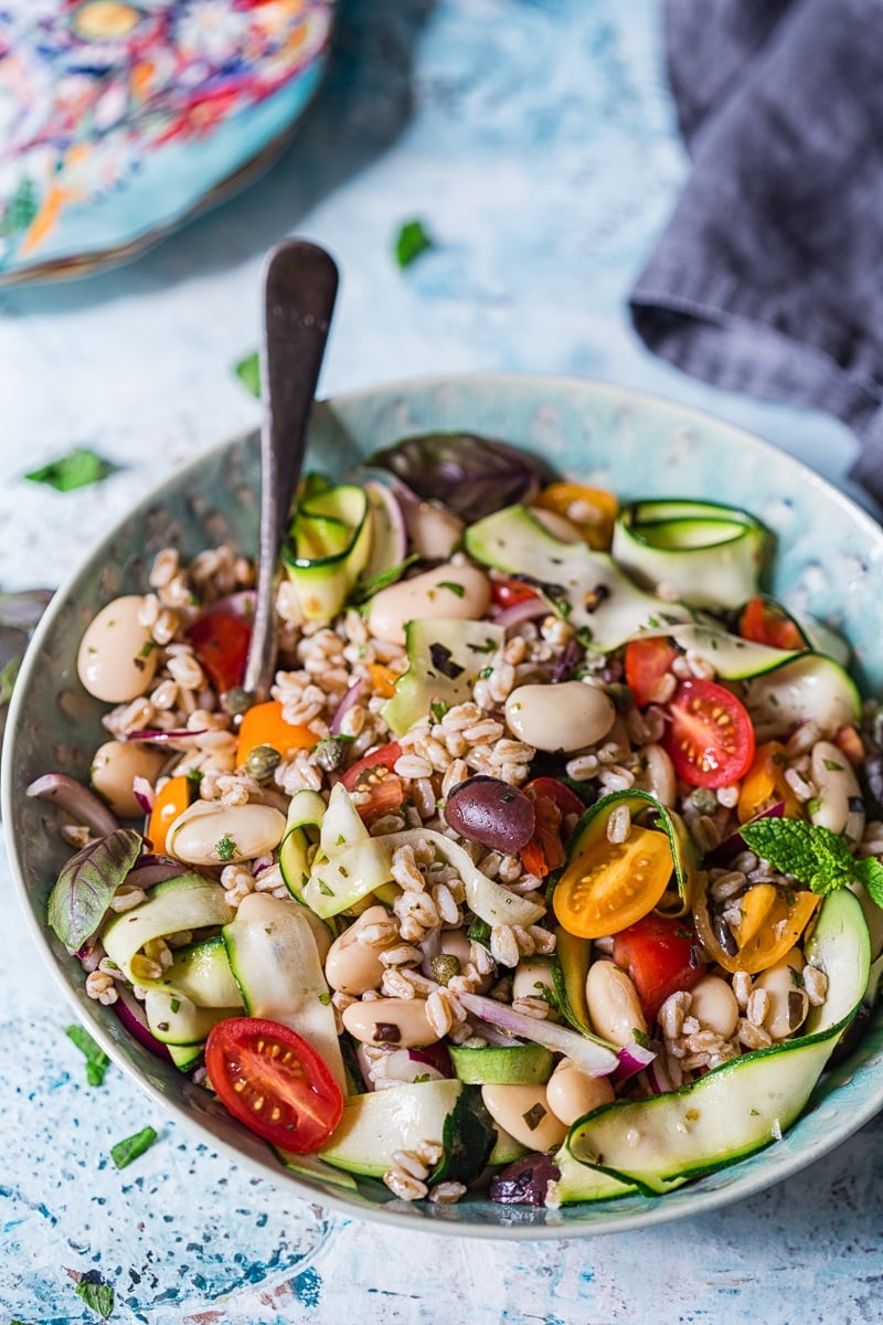 Herby Farro Salad with Olives, Cherry Tomatoes and Zucchini Ribbons 