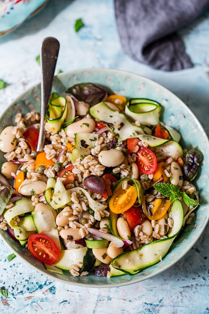 Herby Farro Salad with Olives, Cherry Tomatoes and Zucchini Ribbons 