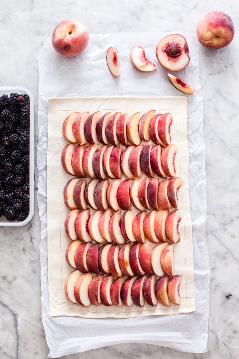 Peaches on the tart and parchment paper