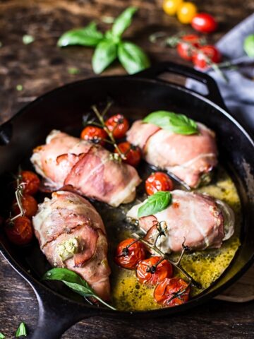 Chicken wrapped in prosciutto in a cast iron pan