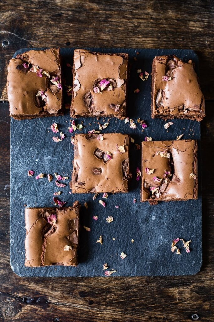 Pieces of Turkish delight brownies on a table