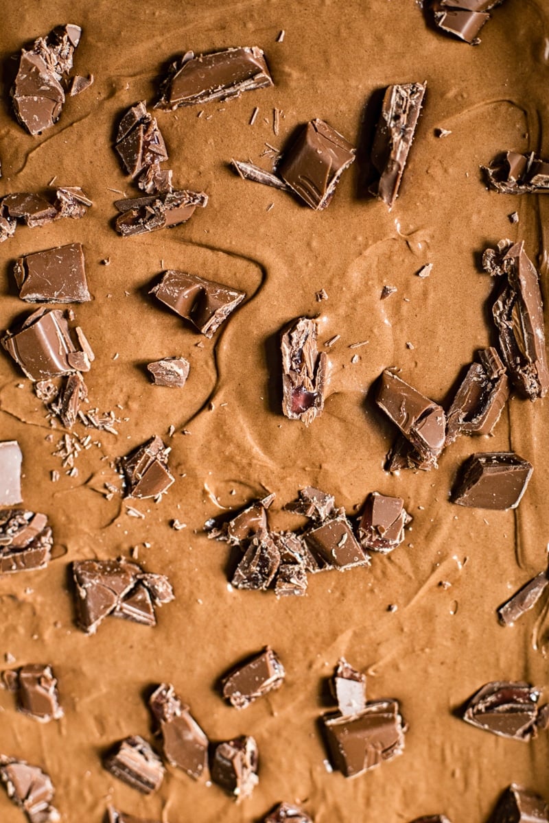 Close up of the brownie top with chocolate pieces