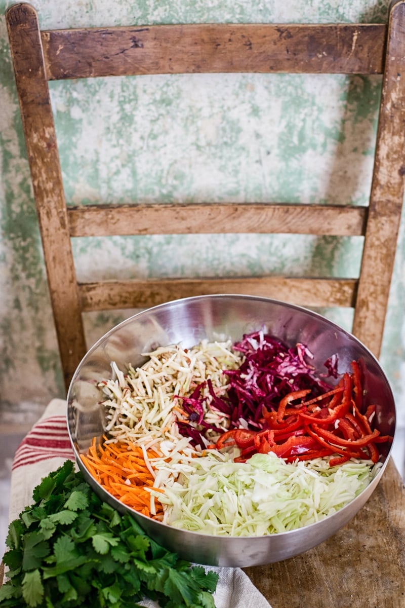 Bowl with shredded vegetables on a chair