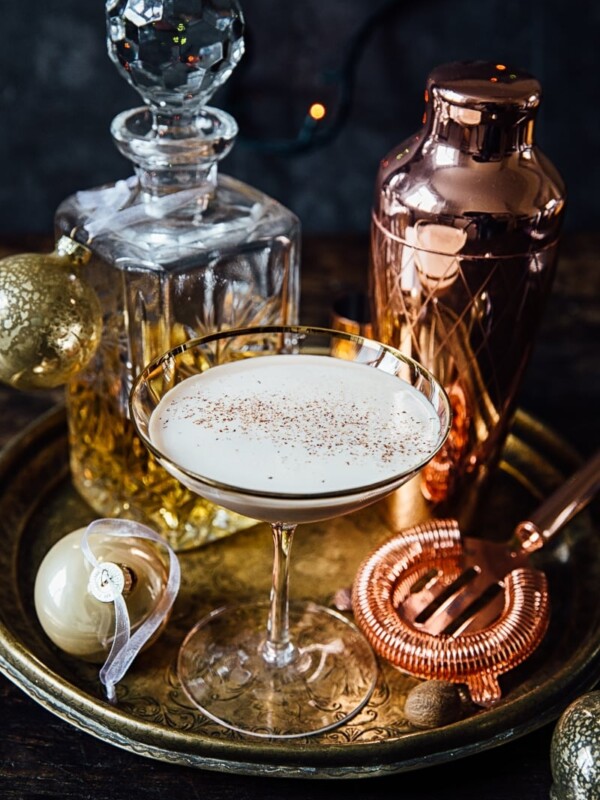 Tray with the cocktail alongside shaker