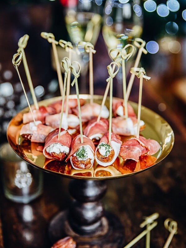 Herby Cheese Stuffed Dates on a latter