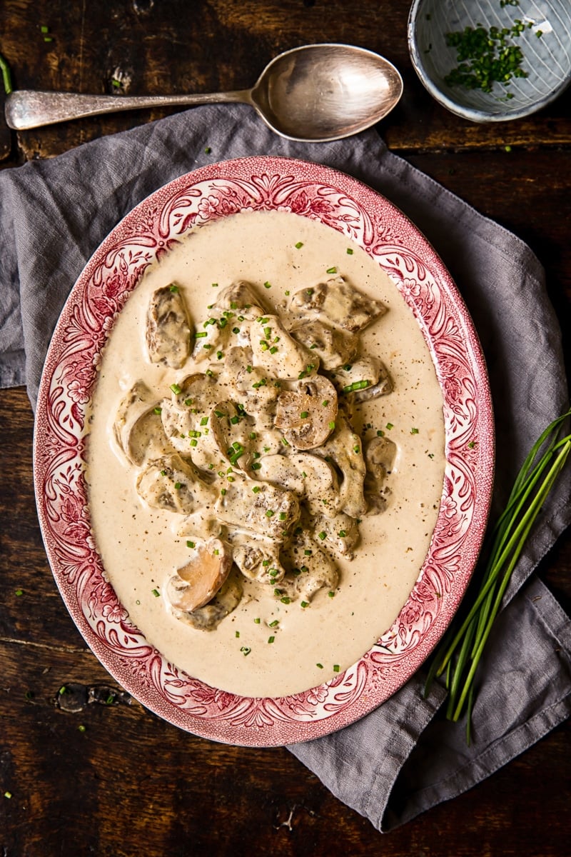 Serving plate of beef in sauce