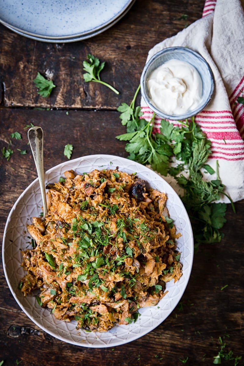 Top down of a bowl of cabbage with sour cream