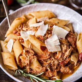 Bowl of the pasta dish with cheese shavings