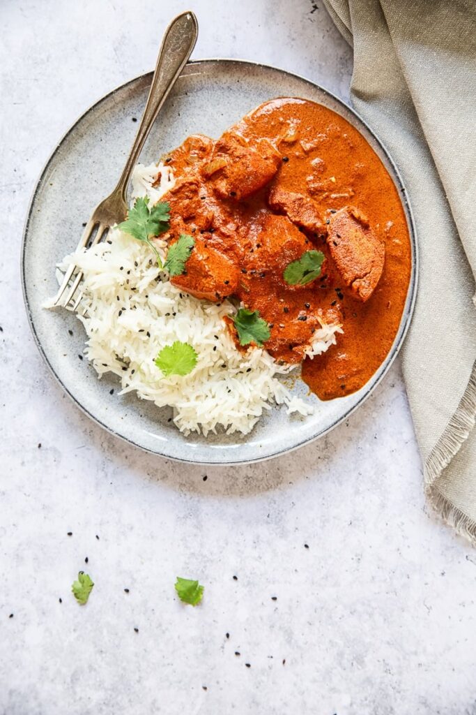 Top down shot of plate with curry and rice