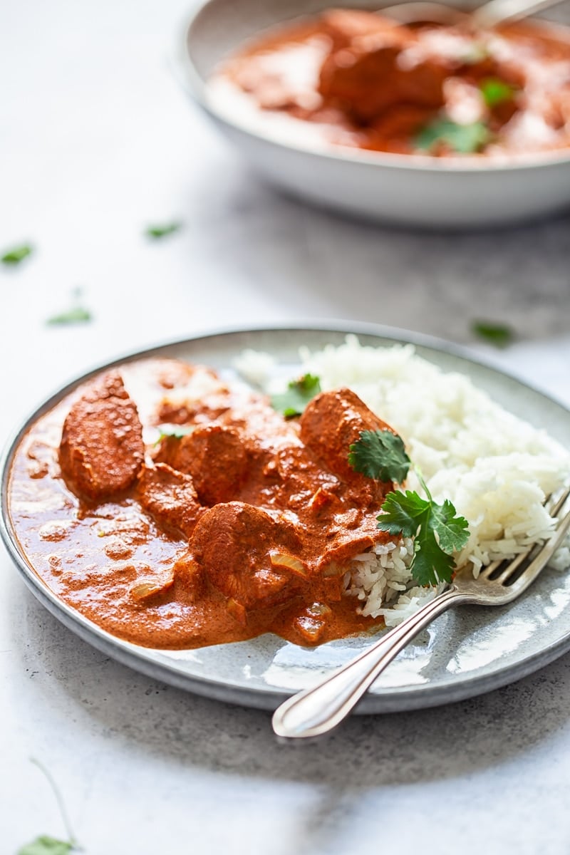 Butter Chicken Curry on a plate with fork