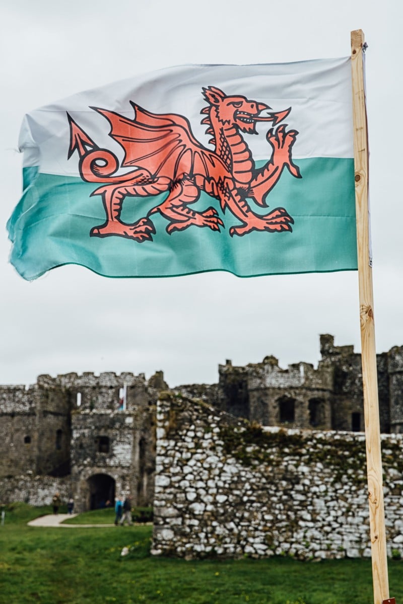 Welsh flag in front of Carew Castle