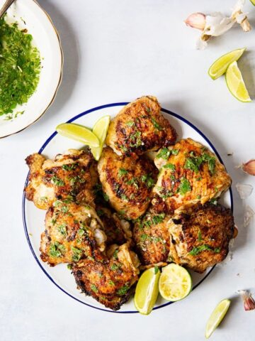 Top down of a plate of mojito grilled chicken thighs