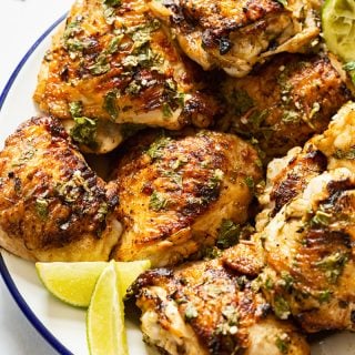 Plate of chicken with lime slices