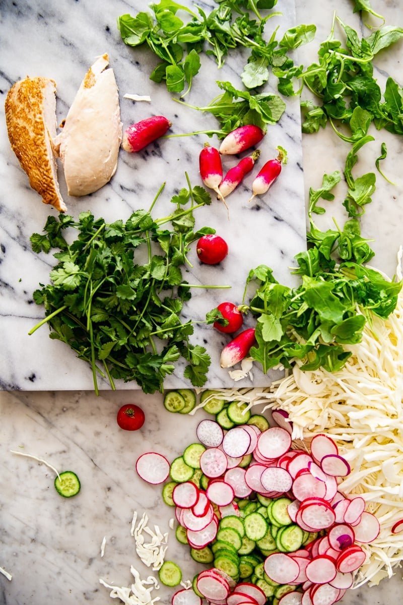 Assortment of ingredients spread over a marble table