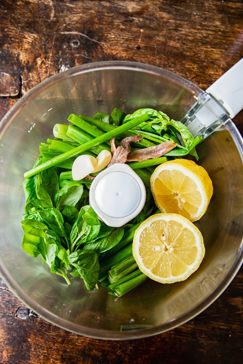 Food processor with greens and lemons