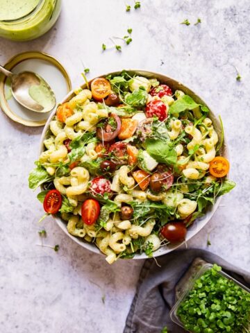 Salad in a bowl with pasta and greens