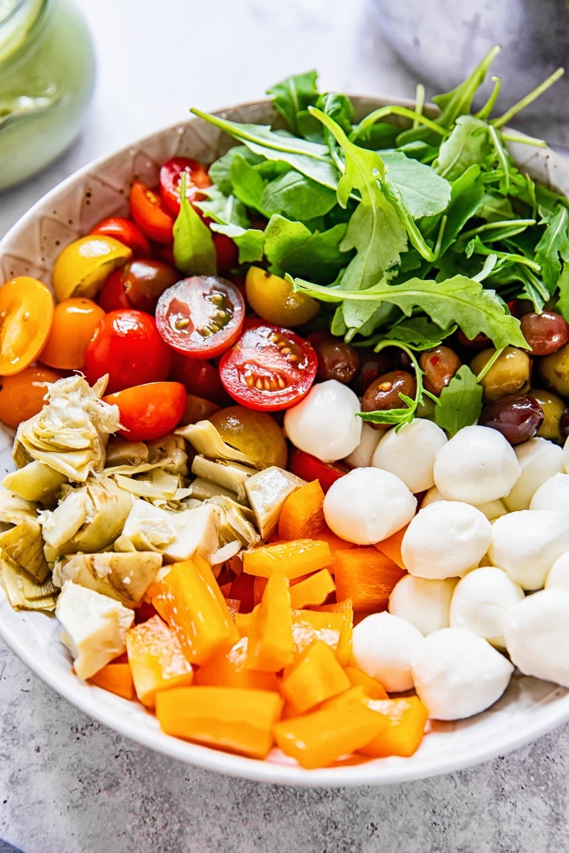 Bowl of green goddess pasta salad ingredients