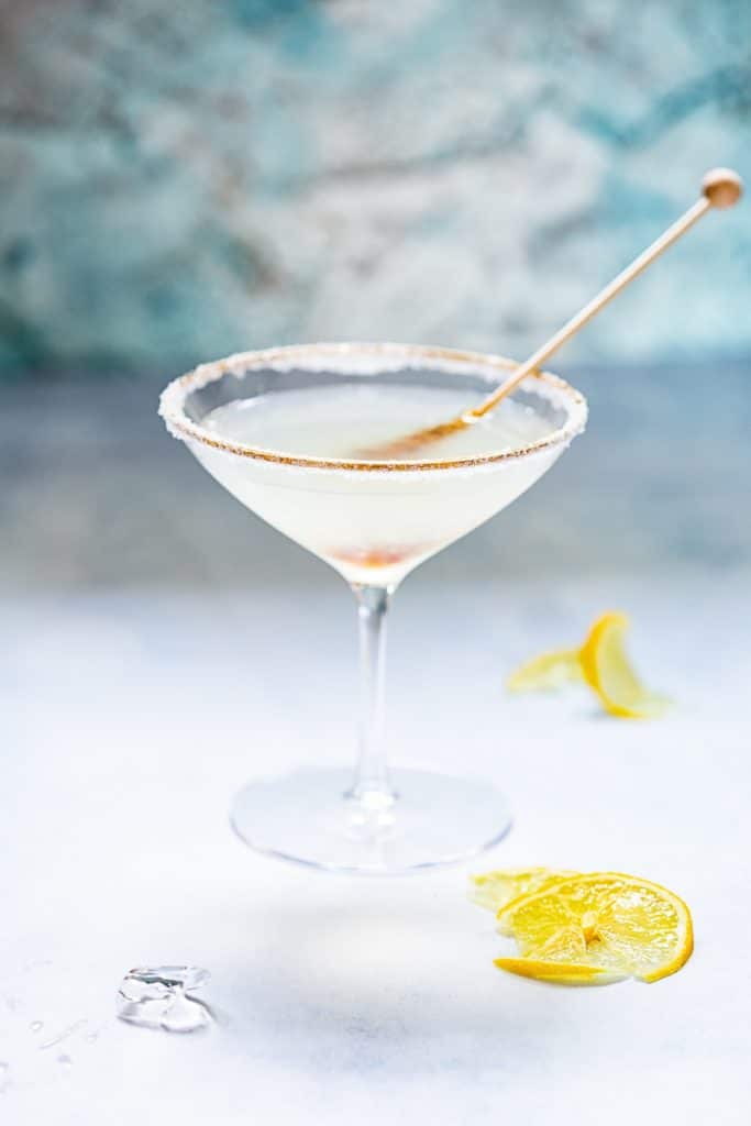 Side shot of stir stick dipped in Lemon Drop Martini