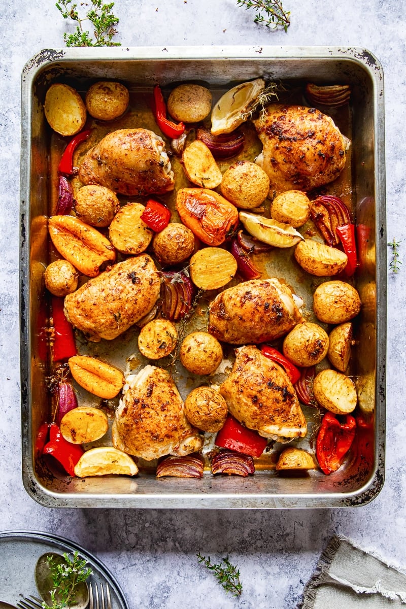 Top down of a tray of chicken and potatoes