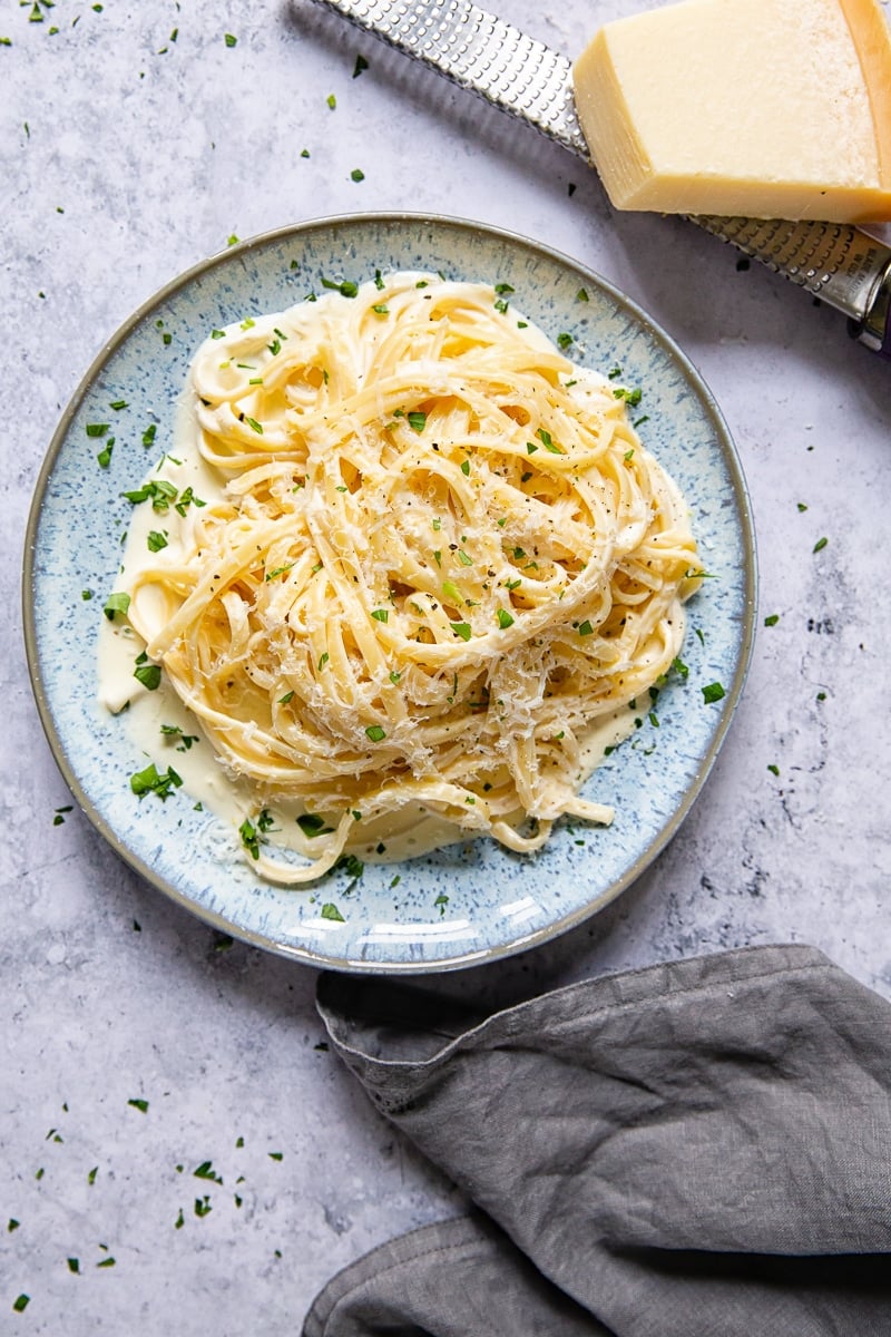 overhead shot of pasta with cream sauce