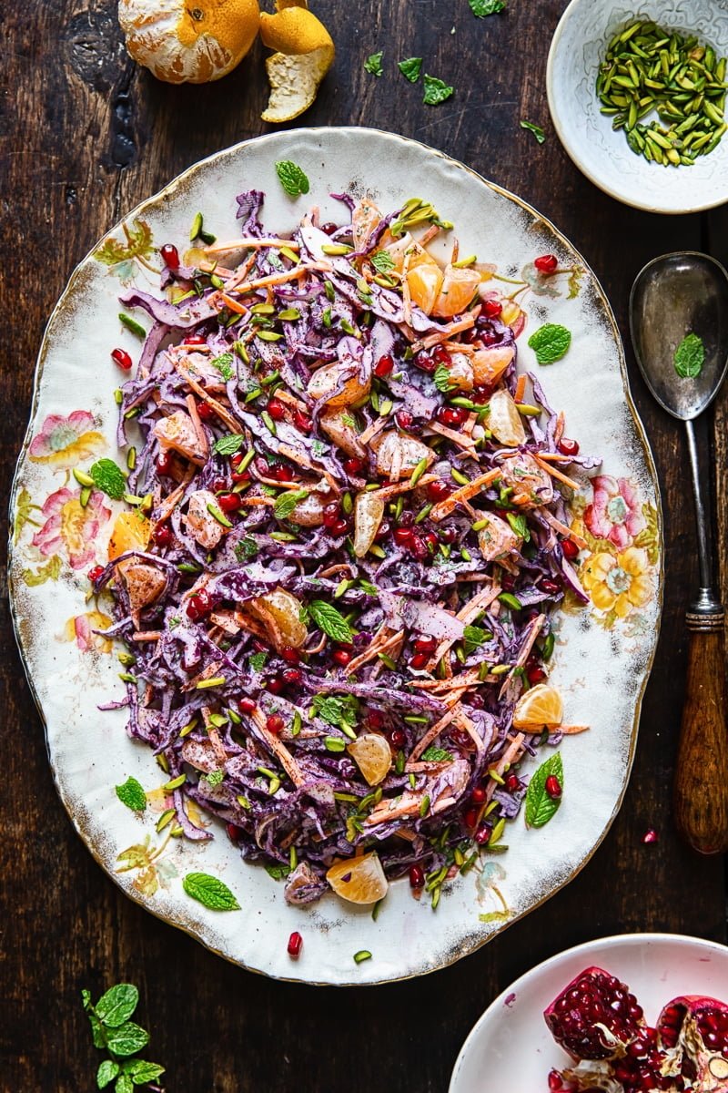Top down view of Festive Red Cabbage Slaw on a plate with a spoon