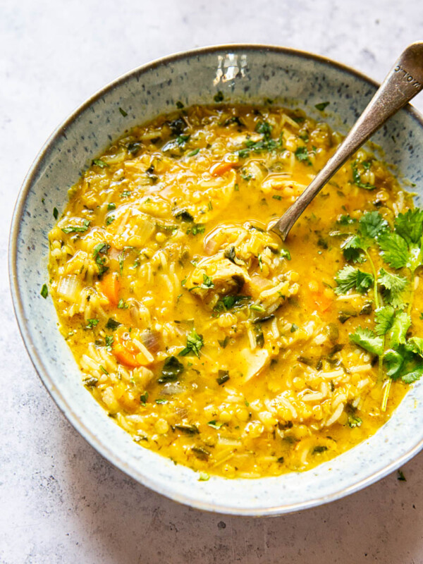 Mulligatawny Soup in a bowl with a spooon