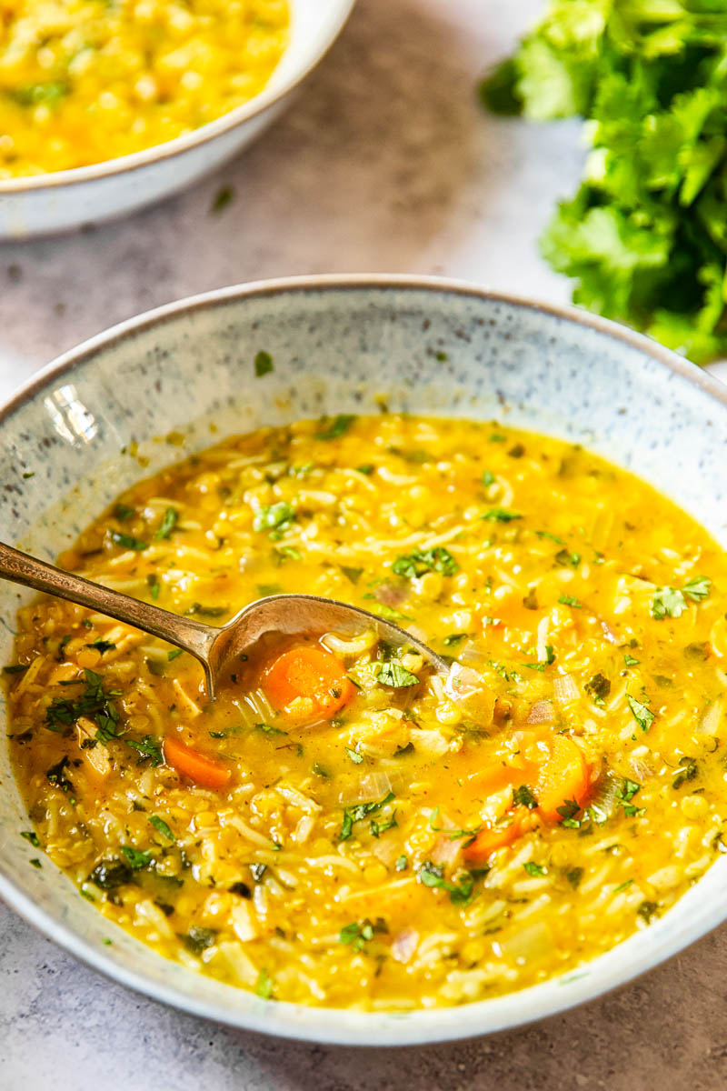 Mulligatawny Soup in a serving bowl from close up