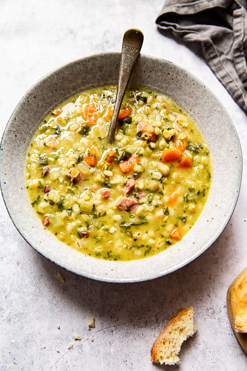 Ham and Pea Soup in a bowl with a spoon