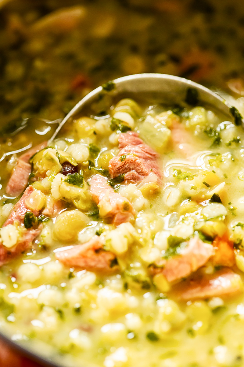 Ham and Pea Soup close up with a ladle