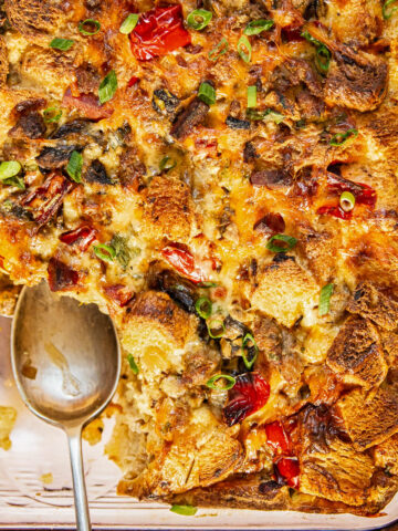 Top down of the overnight breakfast casserole with a spoon