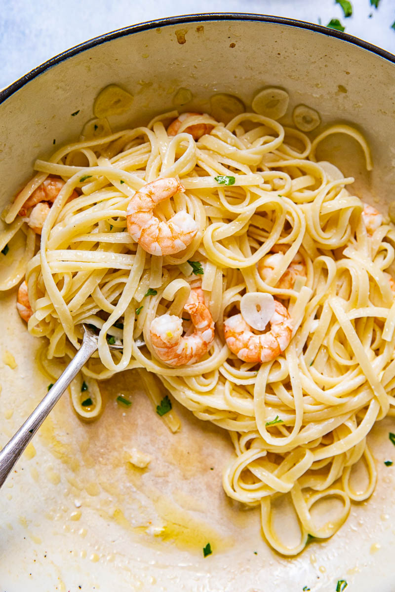 Close up view of Shrimp Scampi Linguine in a pan