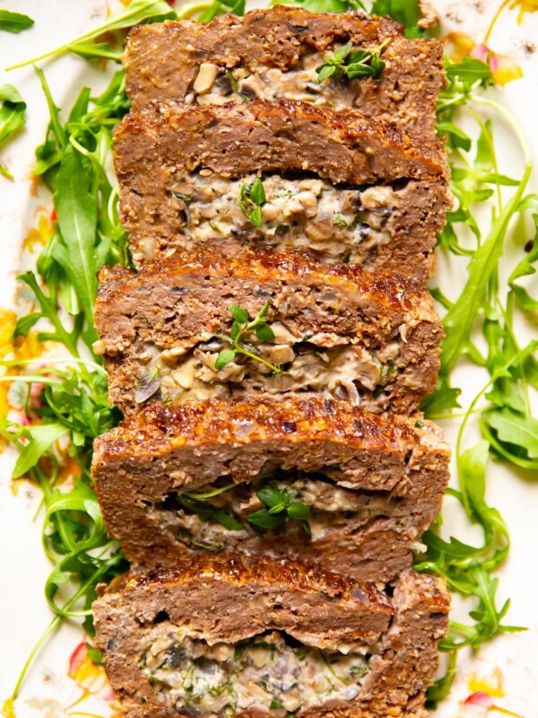 Meatloaf stuffed with creamed mushrooms with herbs and garlic.