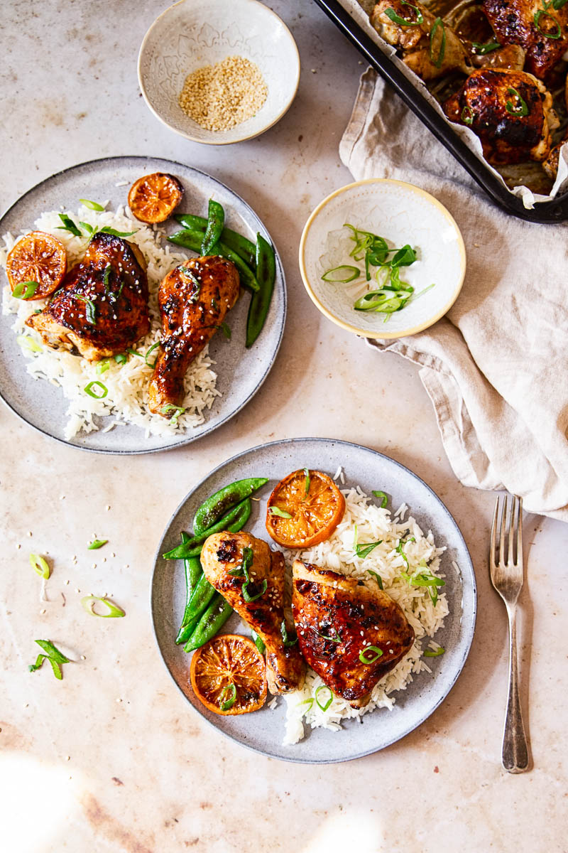 Honey Soy Chicken over white rice with sugar snap peas