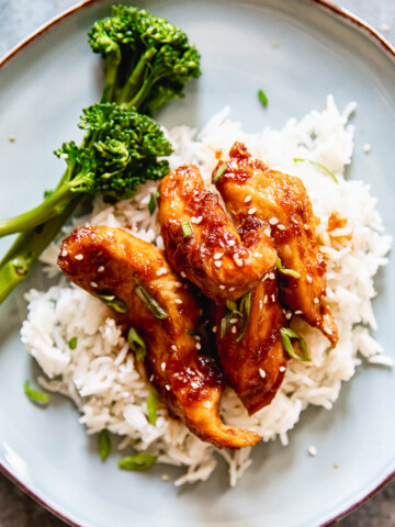 Shoyu chicken over white rice with a side of steamed broccoli
