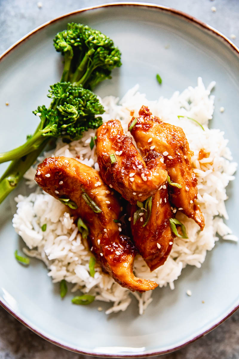 Shoyu chicken over white rice with a side of steamed broccoli