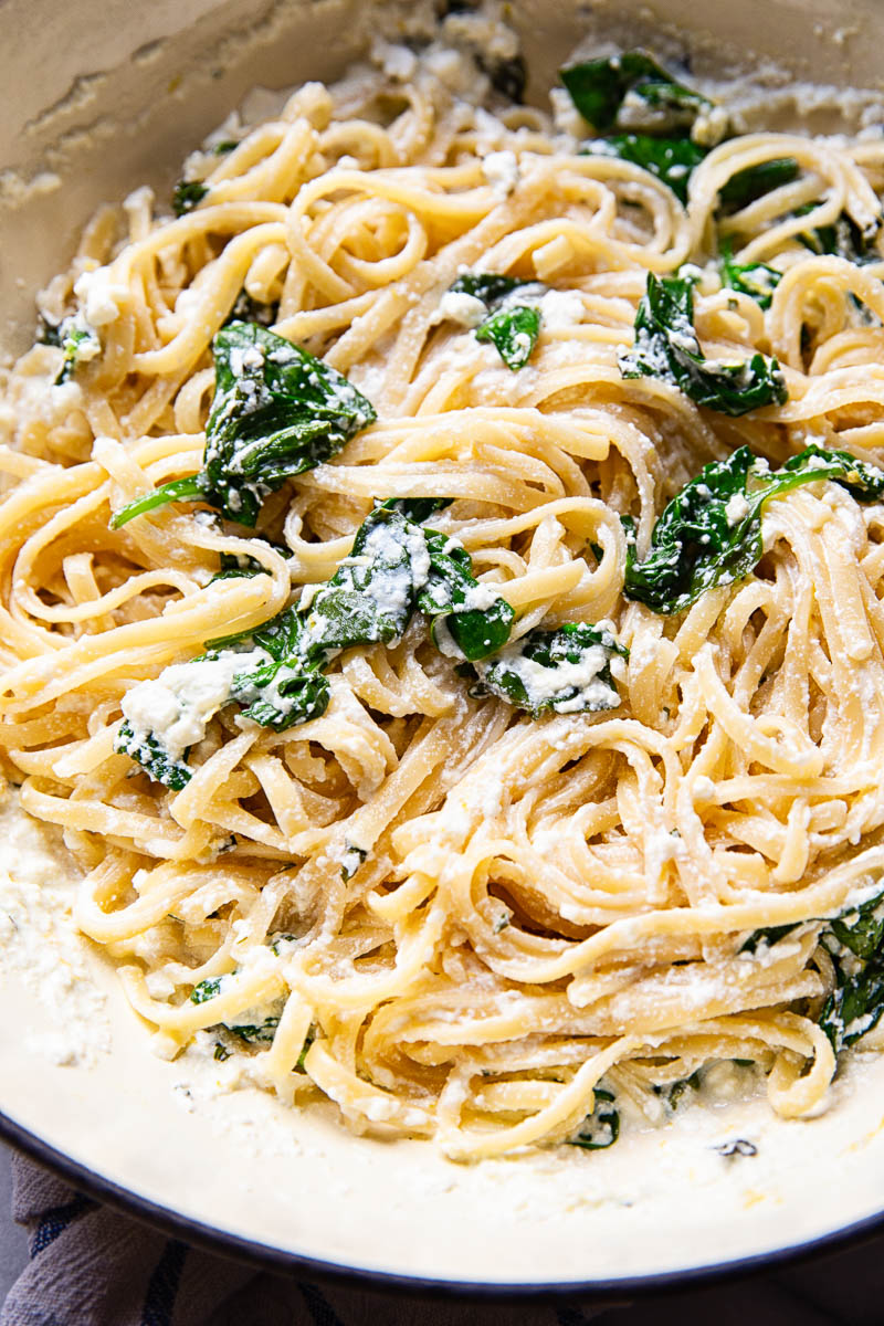 Spinach ricotta linguine in white pan