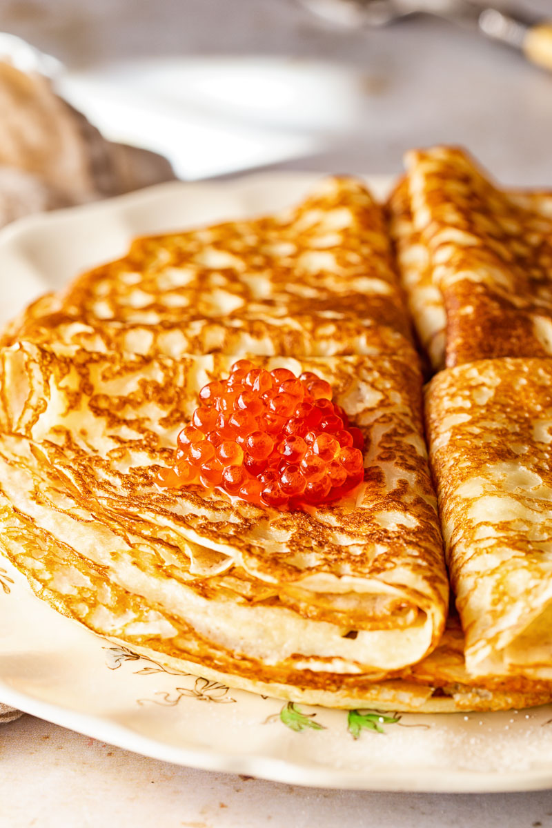 Blini topped with caviar 