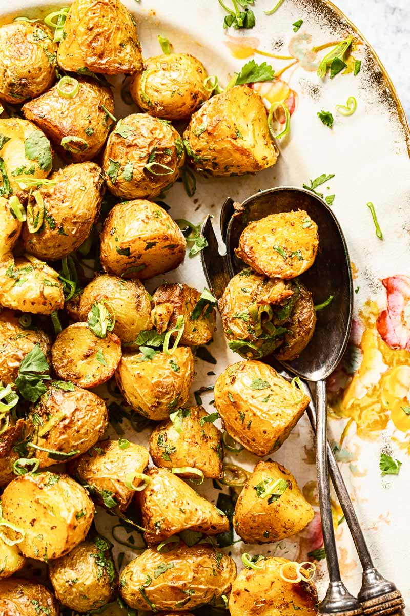 Roasted Baby Potatoes sprinkled with sliced green onions and cilantro