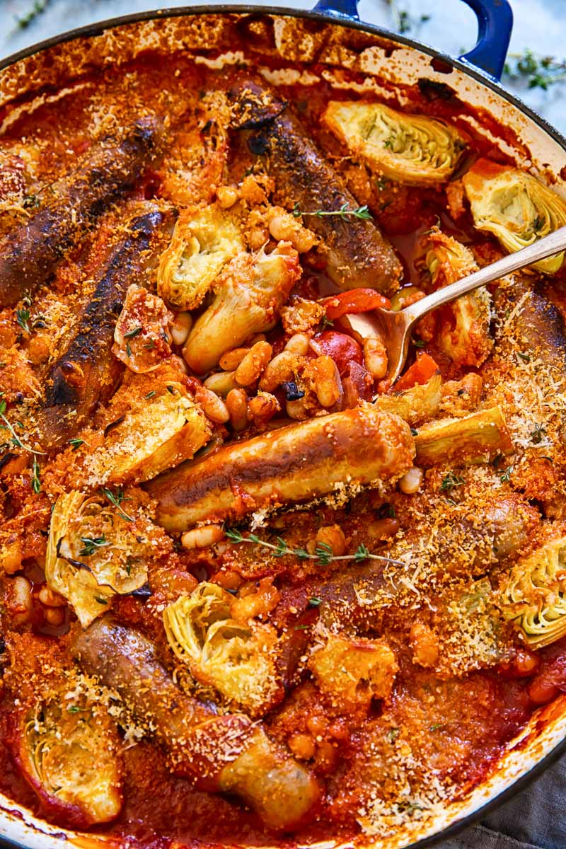 Sausage, white bean and artichoke casserole in tomato sauce