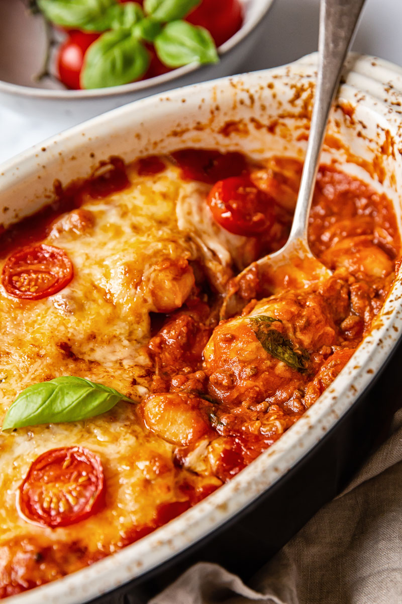 baked gnocchi with a spoon in the dish